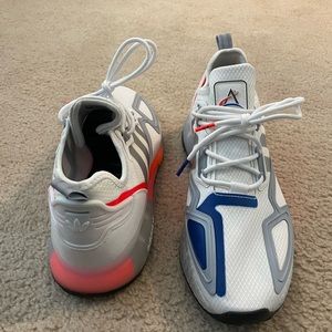 Brand new never worn Adidas size 10 NASA sneakers